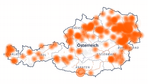 Das Bild zeigt eine Österreich-Karte mit pulsierenden orangen Punkten.